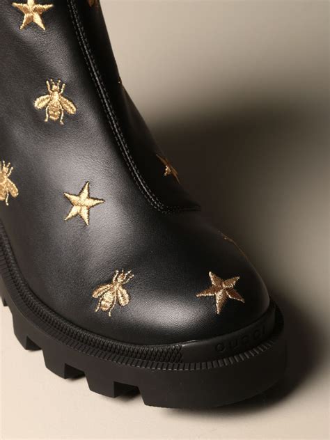 gucci black shoes with bee|Gucci star and bee boots.